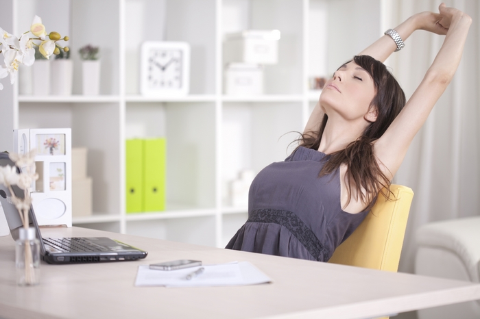 7 Yoga Poses You Can Do in the Office